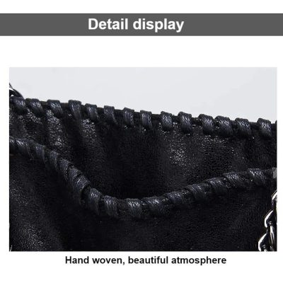 High-quality black leather handbag with hand-woven detail, perfect for stylish accessories and daily use. Crafted with premium materials for durability and a sophisticated look.