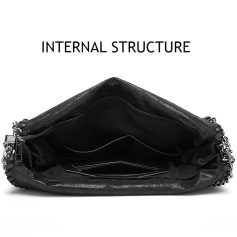 Luxurious black leather Chanel purse featuring chain strap and interior compartments, perfect for sophisticated fashion and everyday use. Ideal for women seeking designer handbags.