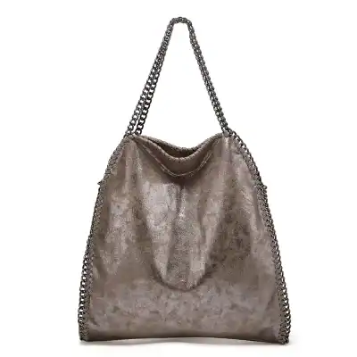 Elegant metallic leather tote with chain strap, perfect for fashion-forward looks and everyday wear. Features a spacious interior and stylish design at Monalisa Medical.