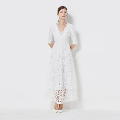 Stunning elegant white lace long dress with 3/4 sleeves, V-neckline, and floral cutout design, perfect for formal occasions or summer events.