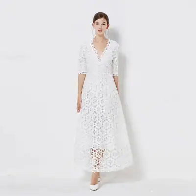Women’s white lace maxi dress with floral cutouts, V-neckline, and 3/4 sleeves, perfect for summer or special occasions. Stylish and comfortable, ideal for fashionable women seeking trendy apparel.