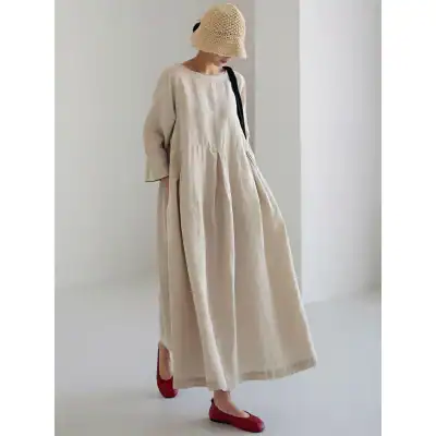 Light beige linen dress with loose fit, wide sleeves, and flowy silhouette perfect for casual or elegant occasions at Monalisa Store.