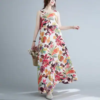 Vibrant floral maxi dress ideal for summer, beach, or casual outings, featuring a colorful tropical botanical pattern and sleeveless design. Perfect for warm weather and outdoor events.