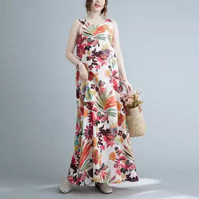 Bright floral summer maxi dress, perfect for beach or casual outings. Features vibrant tropical prints, comfortable fit, and breathable fabric for all-day comfort.