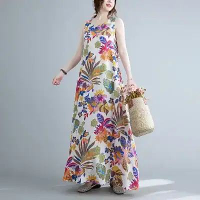 Bright floral summer dress perfect for warm weather, beach, or casual outings. Features vibrant, colorful floral pattern, sleeveless design, and comfortable fit.