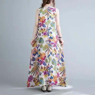 Elegant floral maxi dress for women with colorful tropical print, perfect for summer and casual occasions. Made from lightweight, breathable fabric for comfort and style.