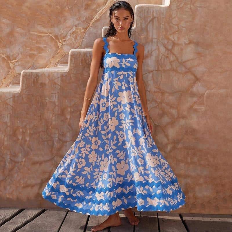 Elegant blue floral maxi dress for women, ideal for casual, beach, and summer outings. Features lightweight material, comfortable fit, and trendy design, perfect for dressing up or down. Available at Monalisa Store.