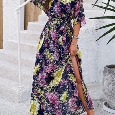 Elegant floral maxi dress perfect for summer and spring occasions, featuring a thigh-high slit, vibrant print, and adjustable waist for a stylish, comfortable fit.