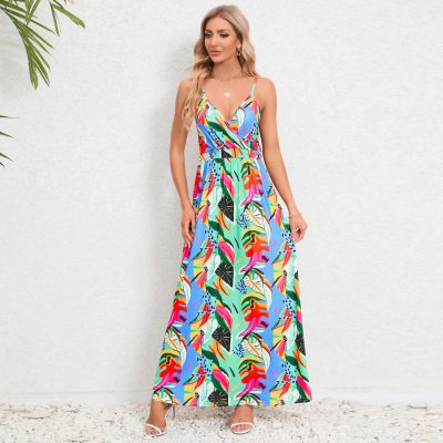 Colorful tropical print maxi dress with adjustable straps and flowy silhouette, perfect for vacation or casual outings.