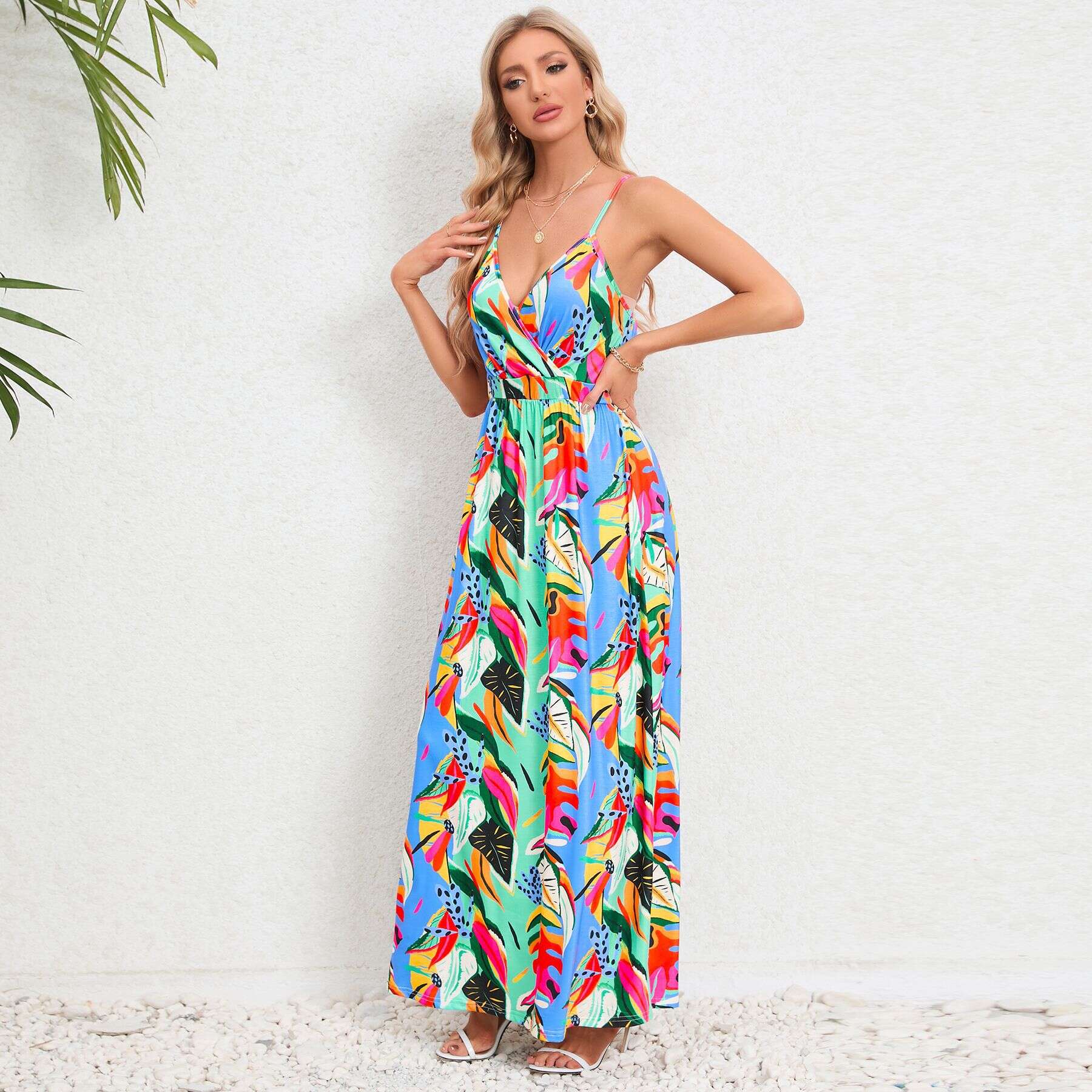 Colorful floral maxi dress perfect for summer beachwear and resort vacations. Made with breathable fabric, stylish design, and adjustable straps for a perfect fit.