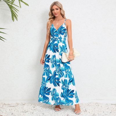 Stylish white and blue tropical print maxi dress with spaghetti straps for women.
