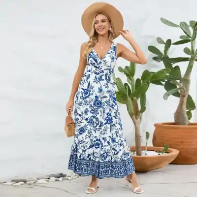Elegant blue and white floral maxi dress perfect for summer, vacation, or casual outings. Comfortable, stylish, and ideal for warm weather, pairing with hats and accessories for a chic look.