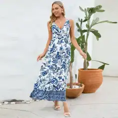 Elegant white and blue floral maxi dress perfect for summer, garden parties, or casual outings, featuring sleeveless design and comfortable fit.