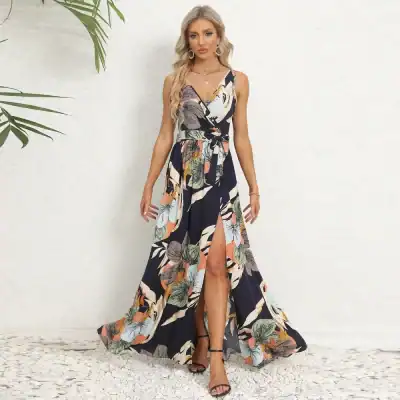Stylish women's max dress with vibrant floral print, slit design, and adjustable tie waist, perfect for summer or vacation wear from Monalisa Store.