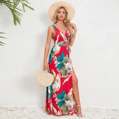Women’s summer floral maxi dress with bold print, deep slit, and adjustable waist featuring vibrant tropical patterns for beach, vacation, or outdoor wear.