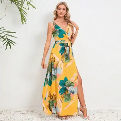 Elegant tropical maxi dress with vibrant floral print, perfect for summer and vacation wear.