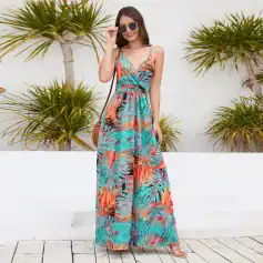 Stylish women’s tropical maxi dress with vibrant leaf print, perfect for summer and beach vacations, available at Monalisa Medical Store for trendy fashion.
