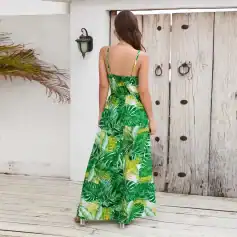 Beautiful tropical print maxi dress with adjustable straps, perfect for beach or summer outings. Stylish, comfortable, and vibrant, ideal for warm weather fashion.