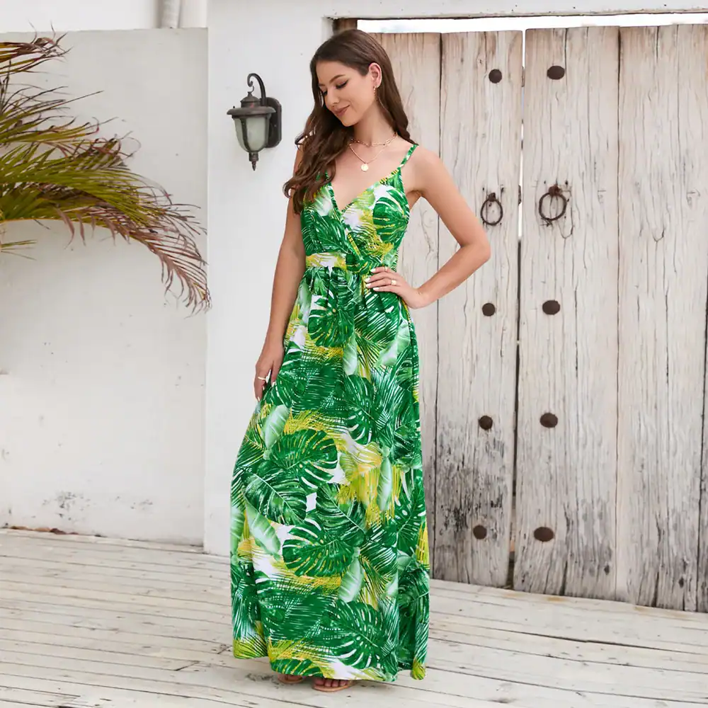 Elegant tropical leaf print maxi dress for women, perfect for beachwear, vacation, or summer outings. Comfortable, stylish, and breathable fit.
