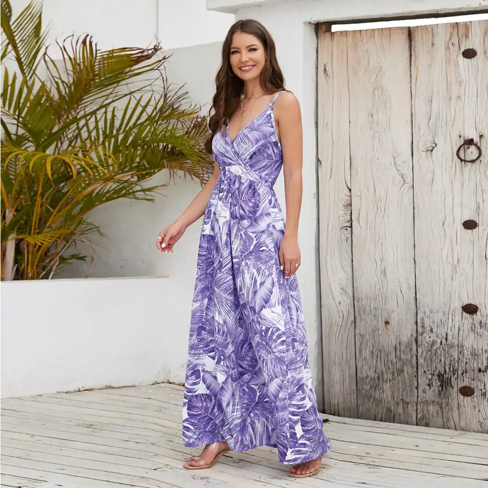 Stylish purple tropical print maxi dress for women, perfect for summer and beachwear, offering comfort and elegance. Ideal for casual outings, vacations, and outdoor events.