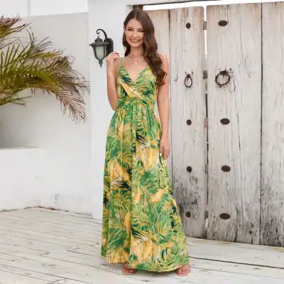 Vibrant tropical printed maxi dress perfect for summer and resortwear, featuring lightweight fabric, adjustable straps, and an elegant flowy silhouette for women.