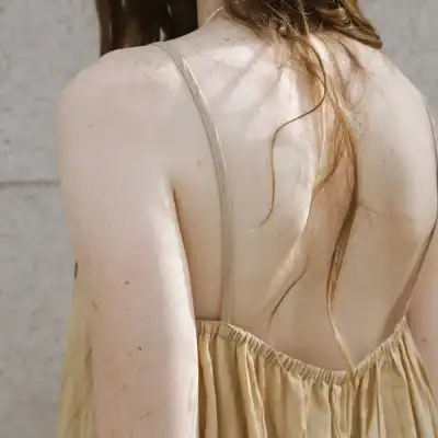 High-quality women's summer dress with floral pattern, spaghetti straps, and back neckline perfect for casual and formal occasions.