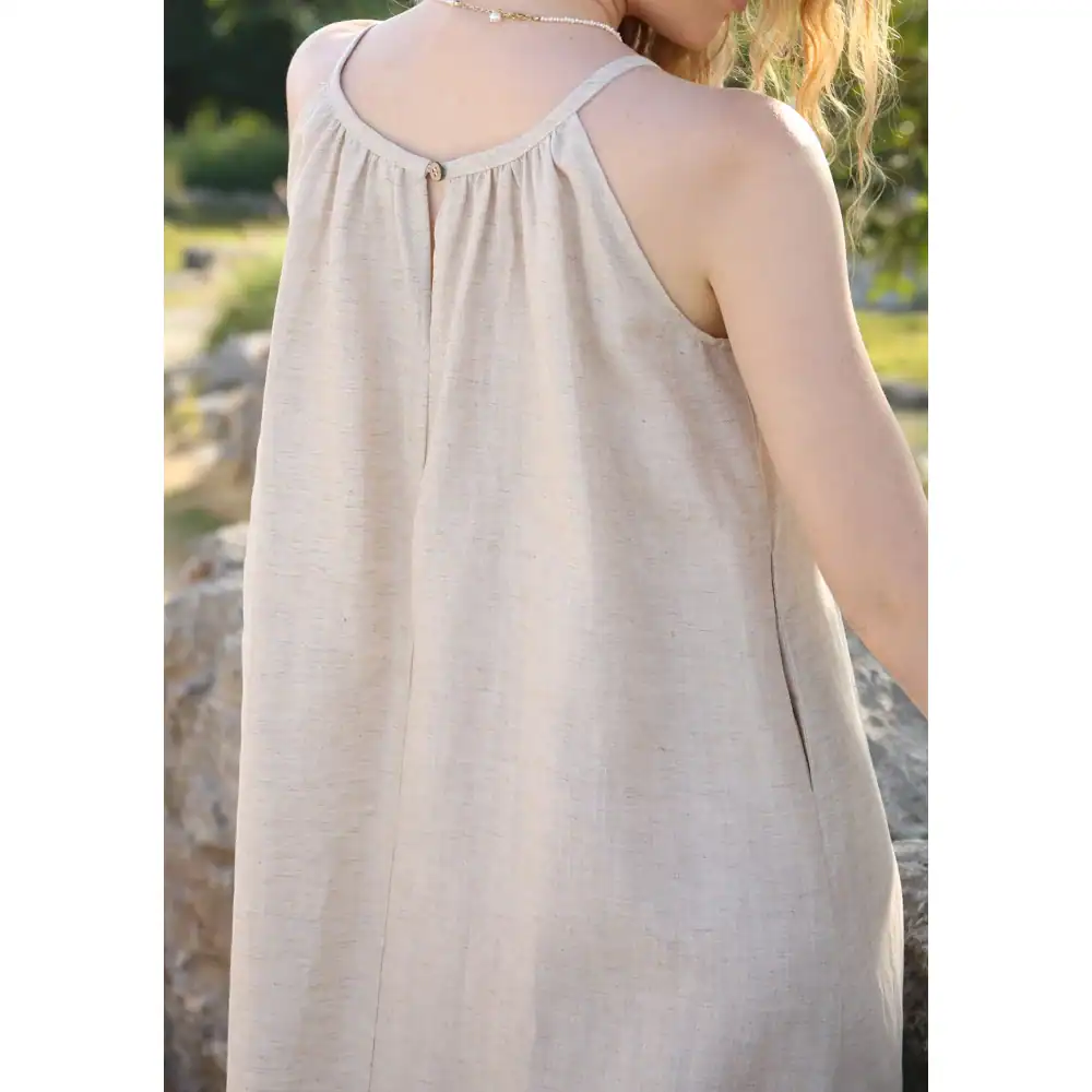 Comfortable women's linen dress with sleeveless design, perfect for summer and casual wear. Made from breathable, lightweight fabric ideal for warm weather.