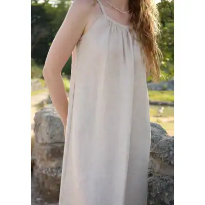 Comfortable, stylish linen dress perfect for summer and outdoor wear, featuring a loose fit, sleeveless design, and soft fabric for everyday fashion.