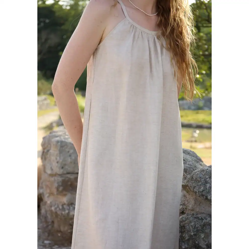Comfortable, stylish linen dress perfect for summer and outdoor wear, featuring a loose fit, sleeveless design, and soft fabric for everyday fashion.
