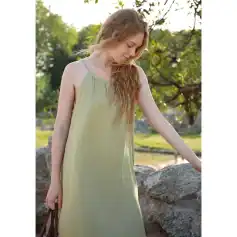 Light yellow maxi dress for women, perfect for summer outings, beach vacations, or casual wear. Made from breathable fabric, offering a relaxed fit for a stylish and comfortable look.