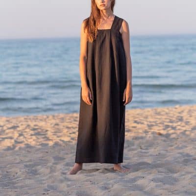 Women’s stylish black maxi dress perfect for beach outings and summer vacations. Comfortable, trendy, and breathable fabric ideal for seaside gatherings and casual wear.