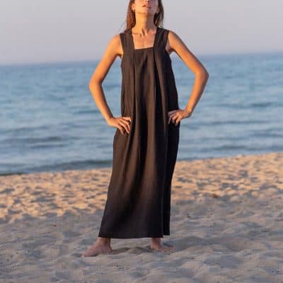 Stylish black maxi dress perfect for beach outings and summer vacations at Monalisa Store. Comfortable, trendy, and ideal for seaside fashion.