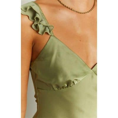 Luxurious satin dress with ruffle accents, perfect for fashionable women seeking sophisticated style and comfort.