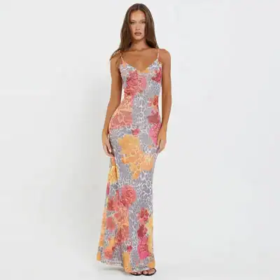 Gorgeous floral maxi dress with vibrant colors, perfect for summer outings and beach events, available at Monalisa Store.