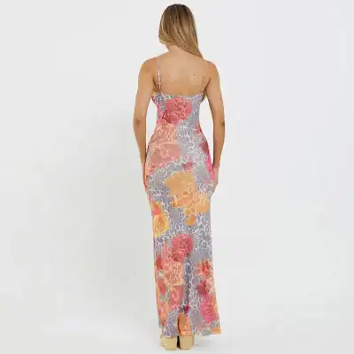 Stylish floral maxi dress featuring vibrant prints and comfortable spaghetti straps, perfect for summer and casual occasions.