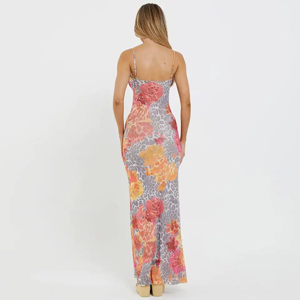 Stylish floral maxi dress featuring vibrant prints and comfortable spaghetti straps, perfect for summer and casual occasions.