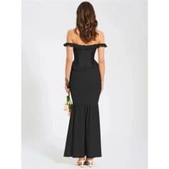 Stylish black off-shoulder evening gown with ruffle details, perfect for formal occasions, weddings, or special events. Flattering silhouette with a sleek finish, designed for confident women.