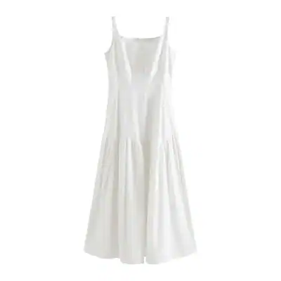 Long white sleeveless dress, perfect for summer or formal occasions, made from lightweight fabric with a flowy, flattering fit.