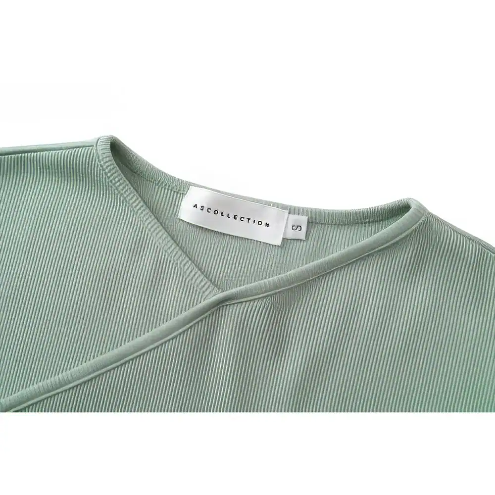 Optical clothing, stylish optical store apparel, minimalist optical top, Monalisa Store fashion, trendy optical clothing, women's optical fashion top.