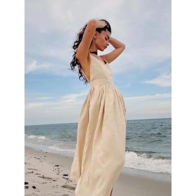 Women’s stylish beach dress for summer vacations, ideal for seaside trips and outdoor leisure. Comfortable, fashionable, and perfect for beach outings and summer holidays.