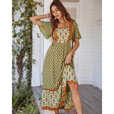 Stylish bohemian summer dress with floral and geometric patterns, perfect for casual outings and beach days. Made from lightweight fabric for comfort and style.