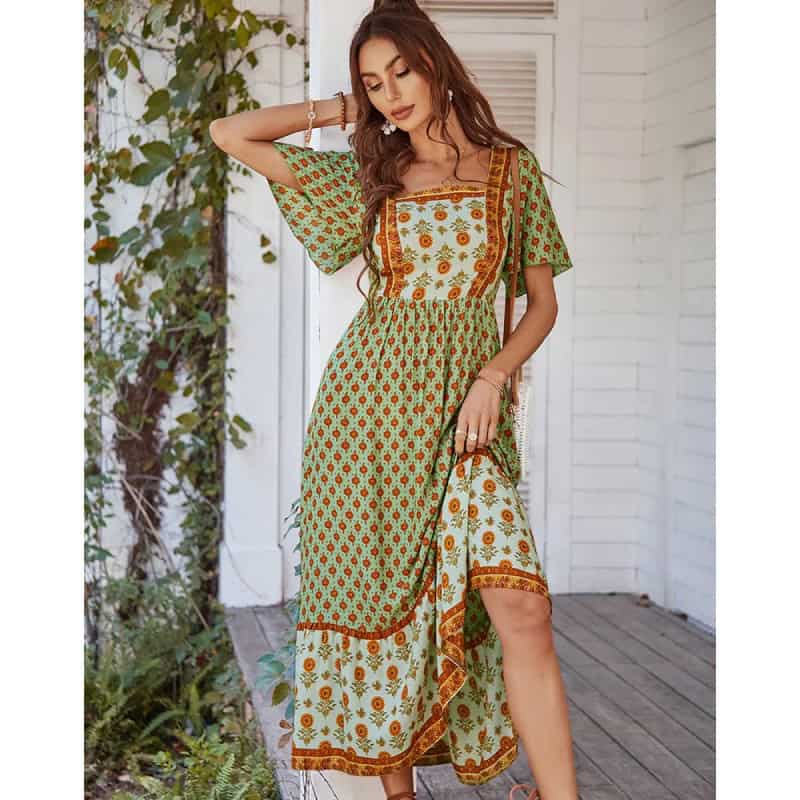 Stylish bohemian summer dress with floral and geometric patterns, perfect for casual outings and beach days. Made from lightweight fabric for comfort and style.