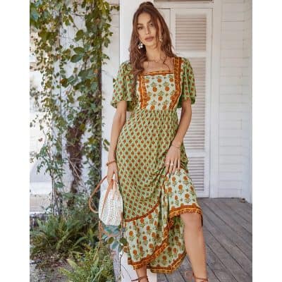 Elegant women's floral midi dress with vibrant colors and flowy design, perfect for summer outings and casual wear, available at Monalisa Store.