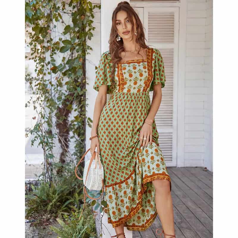 Elegant women's floral midi dress with vibrant colors and flowy design, perfect for summer outings and casual wear, available at Monalisa Store.