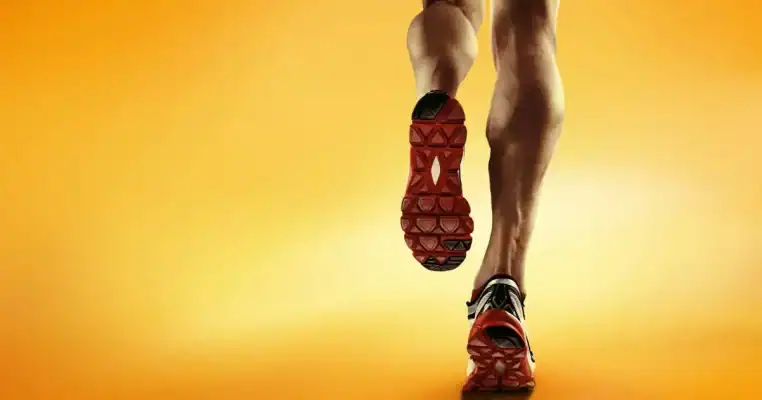 High-performance running shoes with cushioned insoles and durable soles, designed for optimal support and comfort during intense workouts or marathon training.