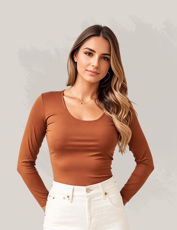 Elegant woman in brown long-sleeve top and white pants, showcasing fashionable clothing at Monalisa Store for women’s apparel.